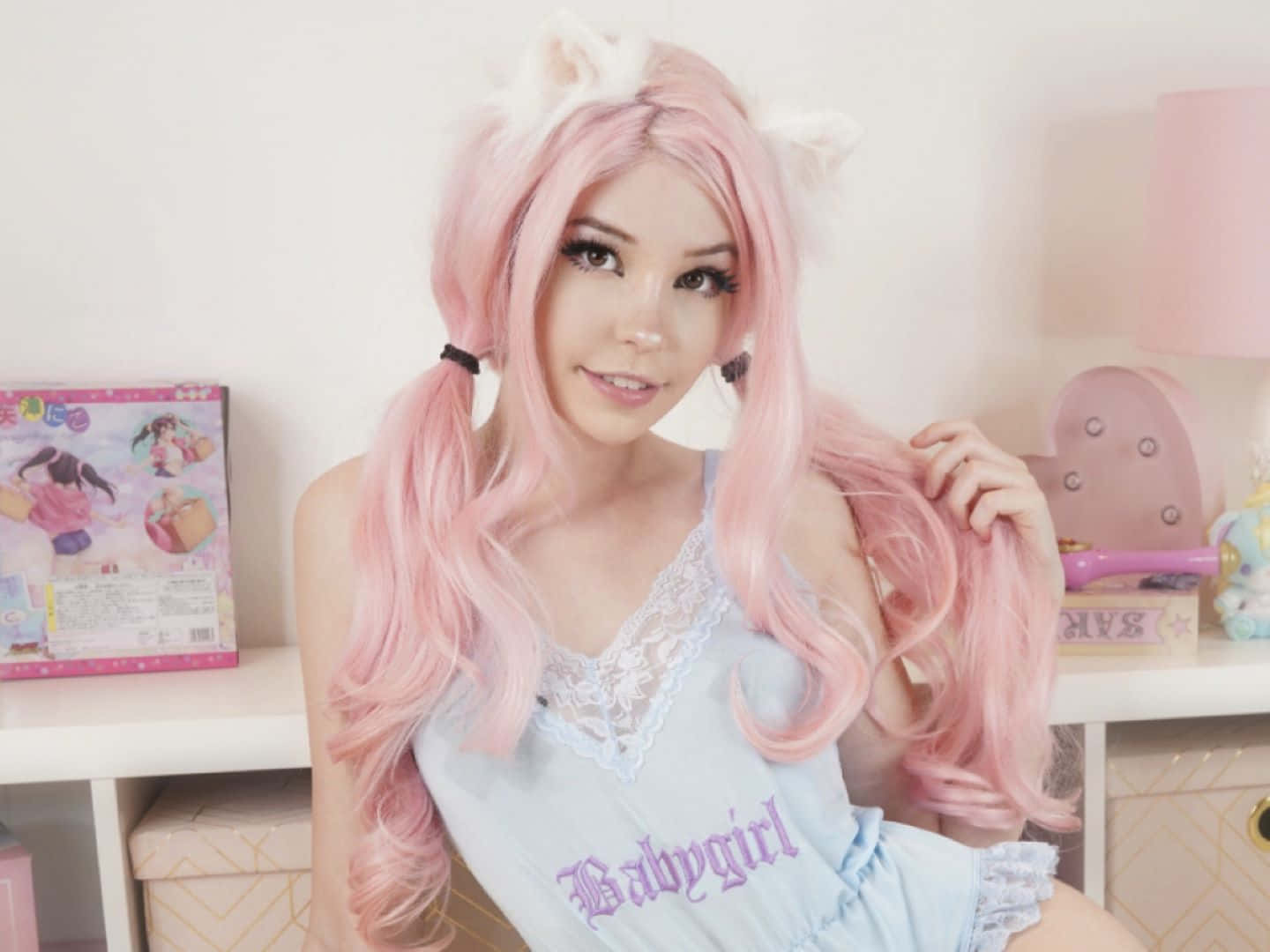 Pink Haired Cosplayerwith Cat Ears Background