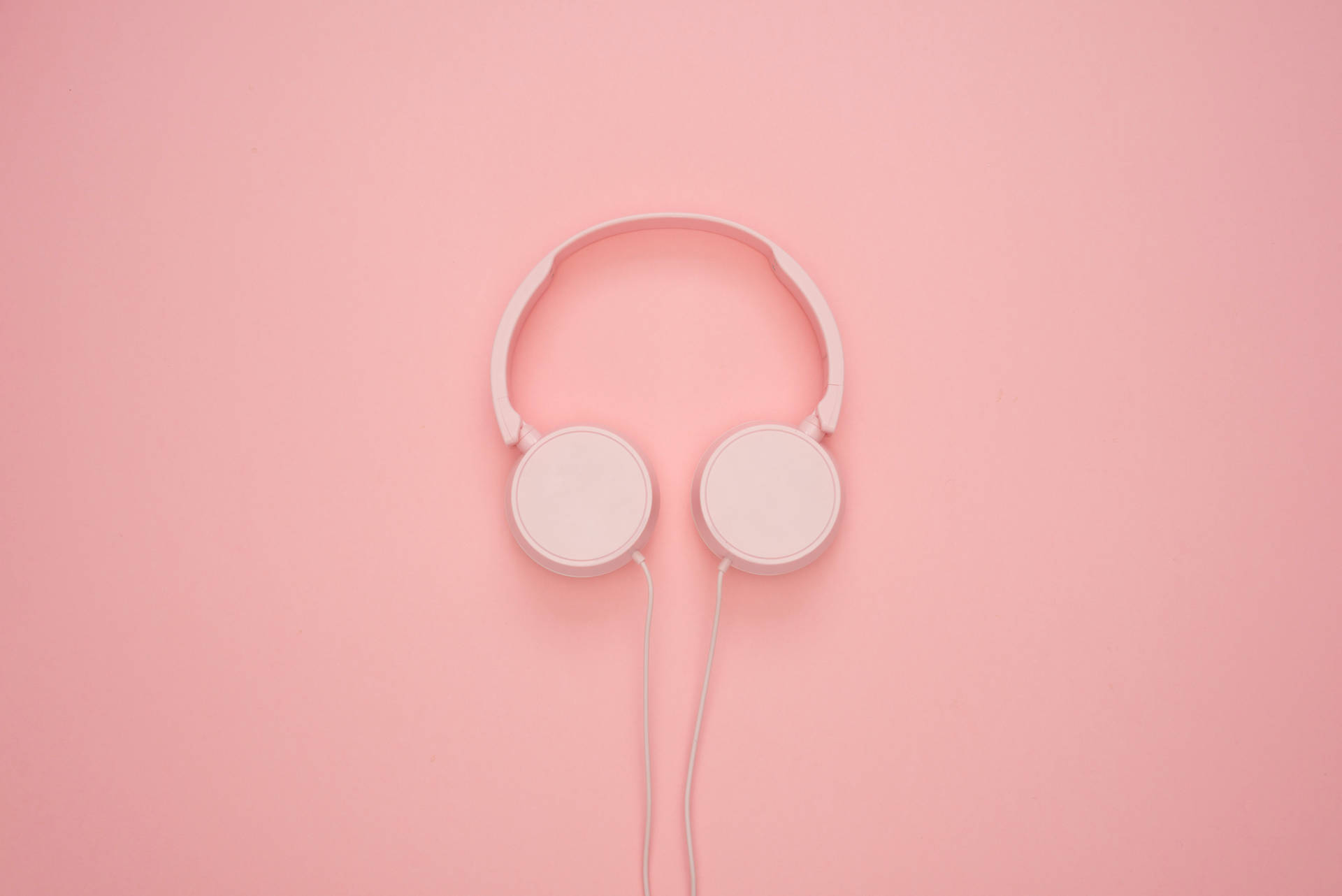 Pink Headphone In Plain Color Background
