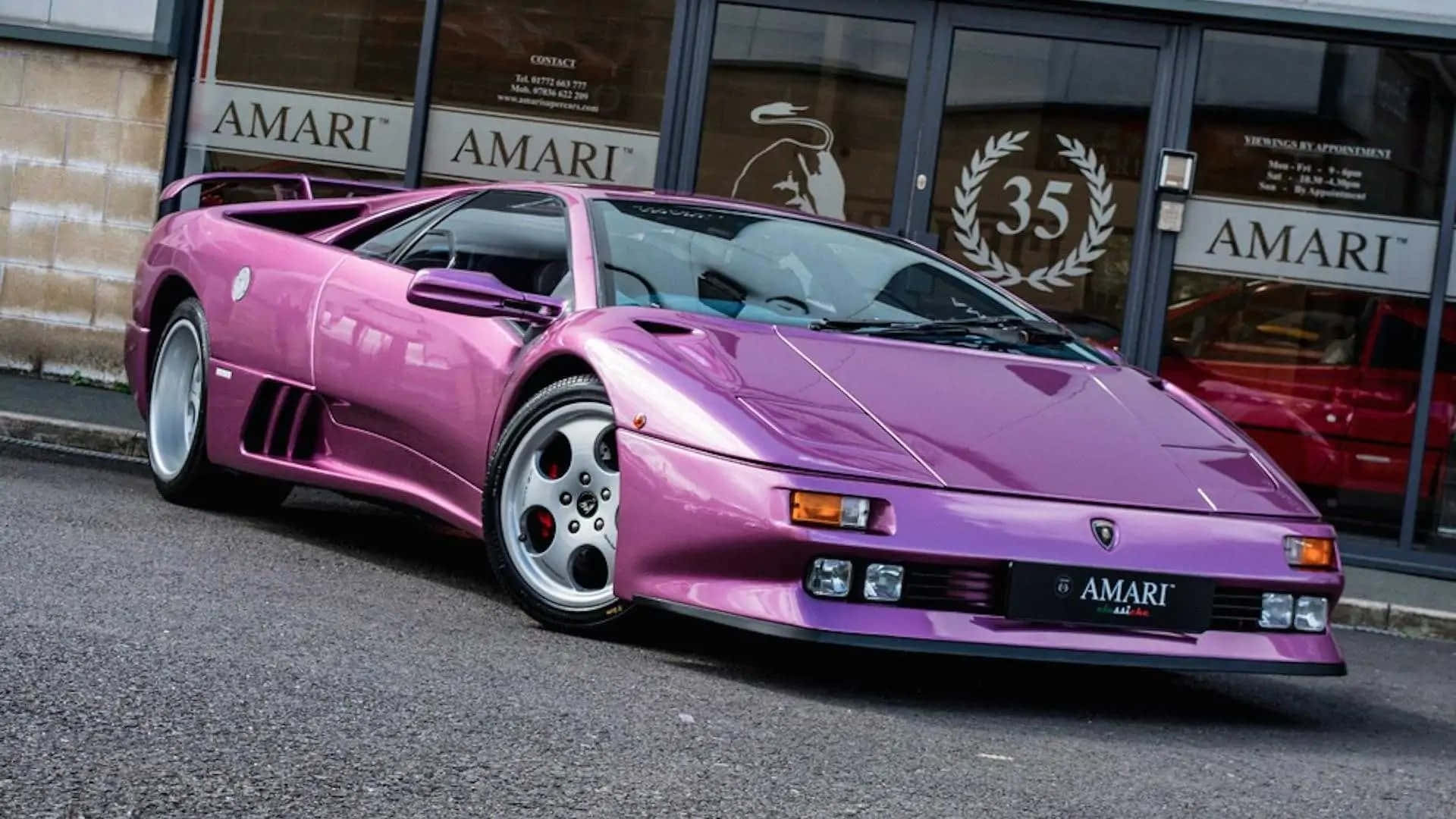 Pink Lamborghini Diablo Outside Dealership