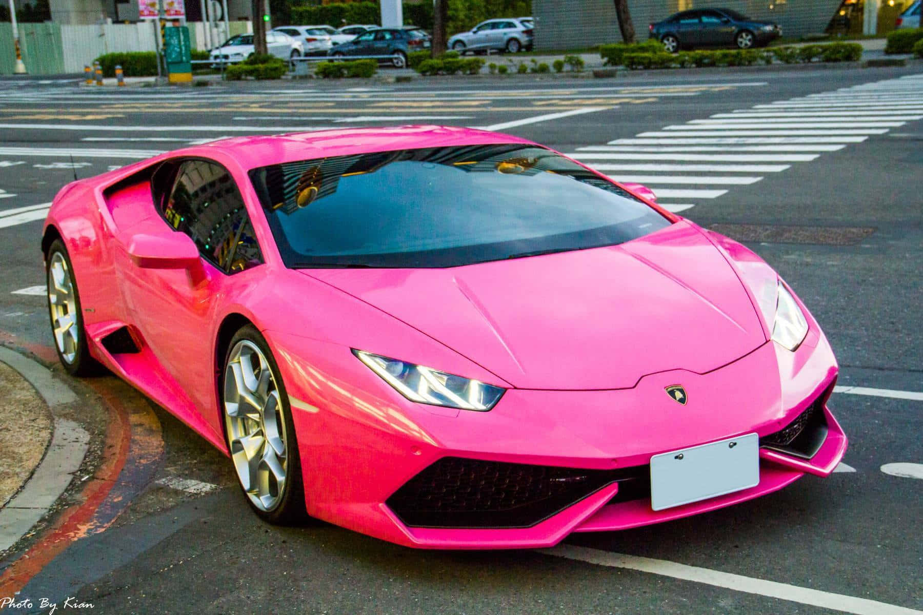 Pink Lamborghini Huracan Urban Setting Background