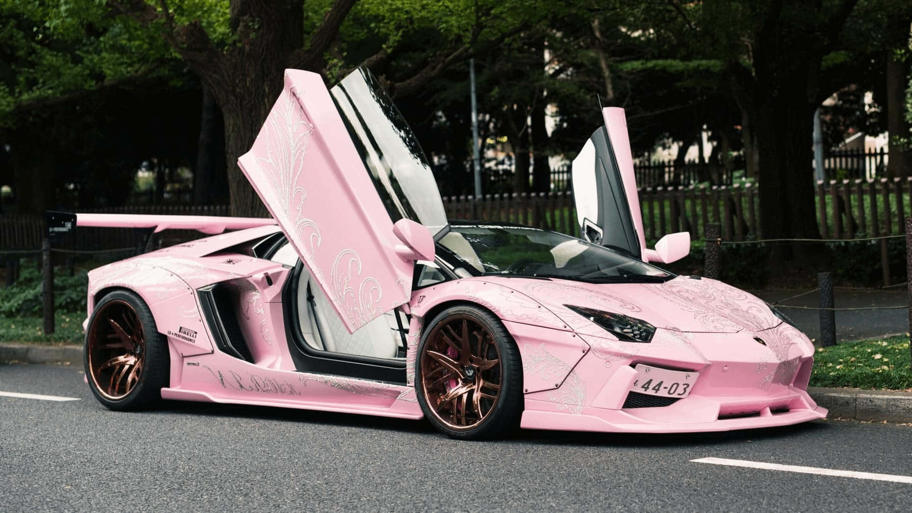 Pink Lamborghini With Doors Open Background