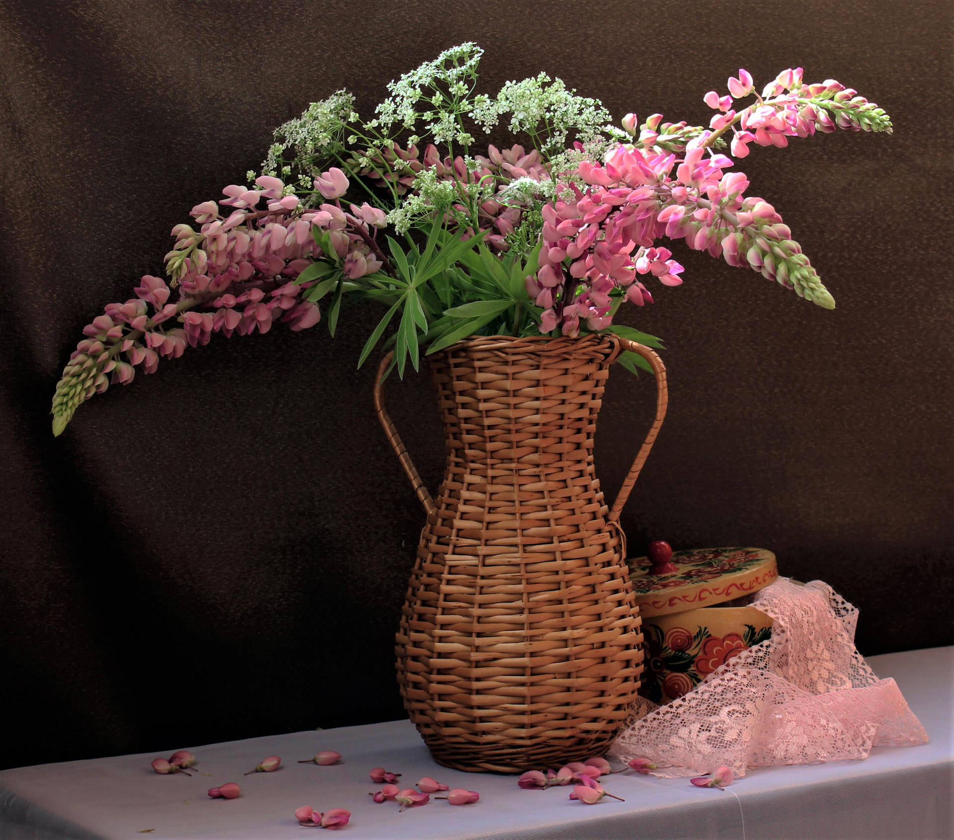 Pink Lupines In Woven Flower Vase