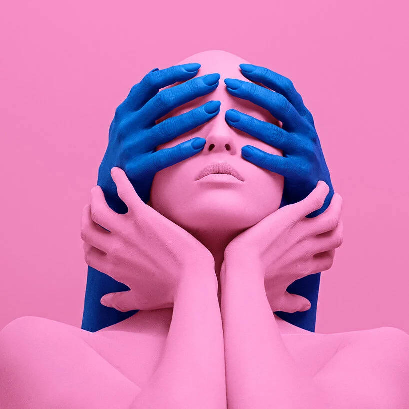 Pink Model With Blue Hands Background