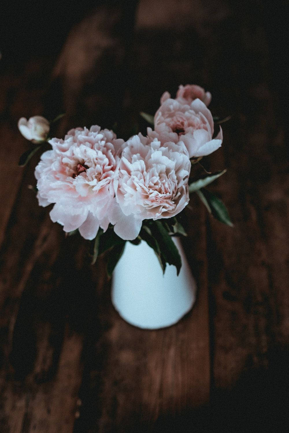 Pink Peonies In A Flower Vase Background