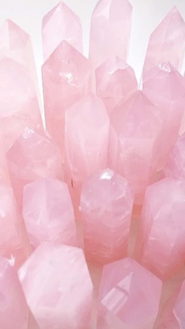 Pink Quartz Crystals Arranged In A Circle Background