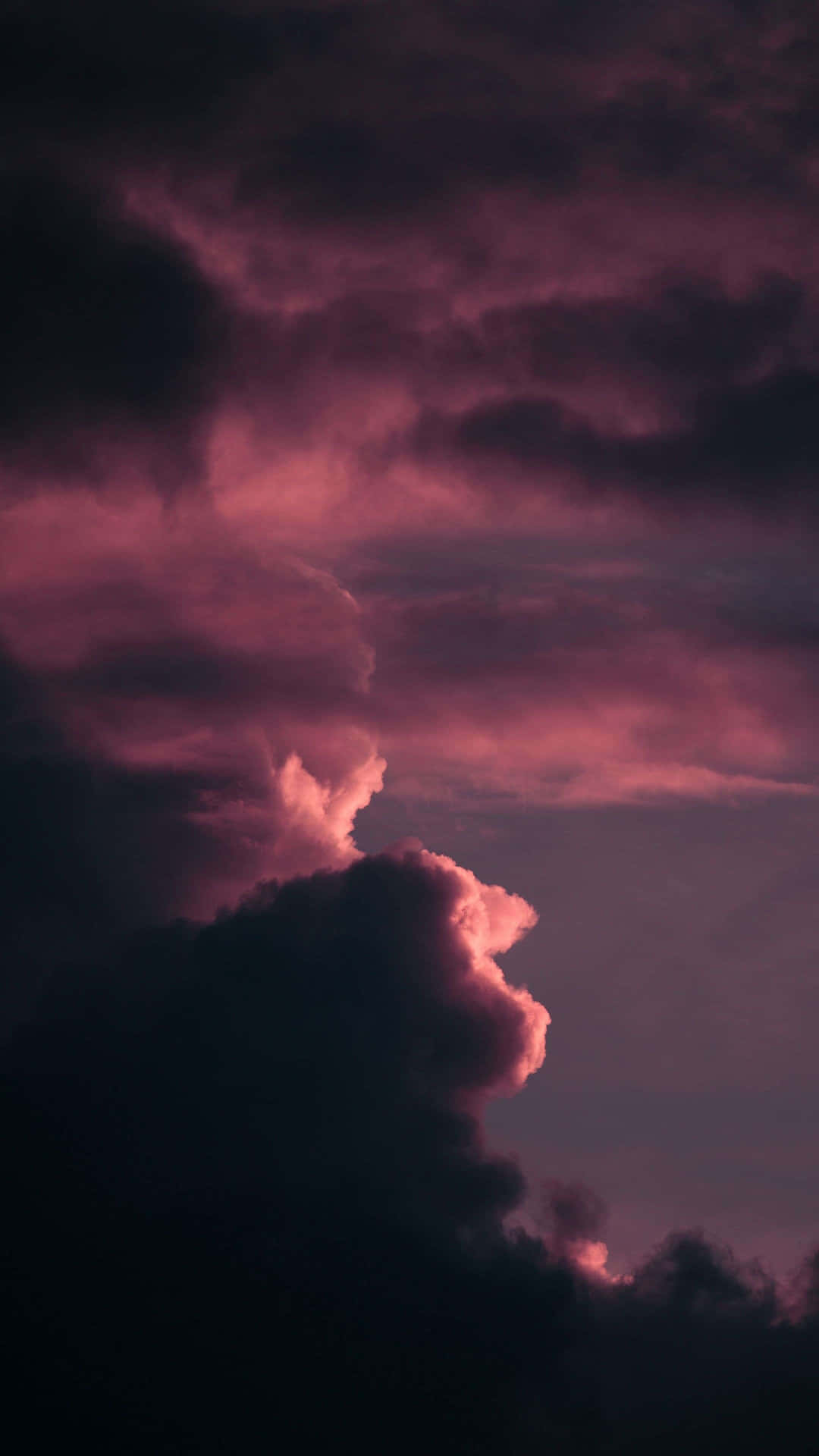 Pink Sky With Black Clouds Background