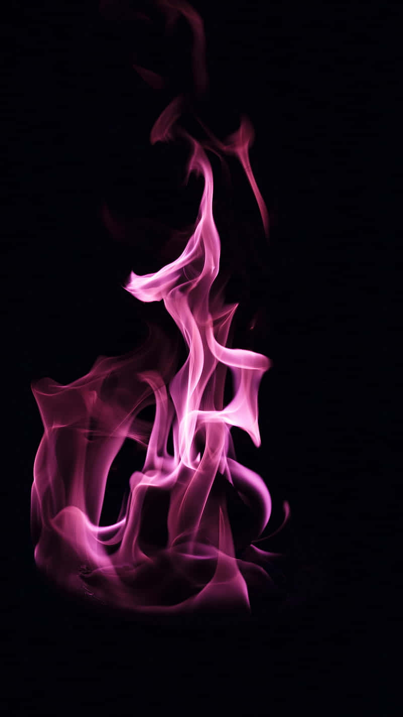 Pink Smoke On A Black Background