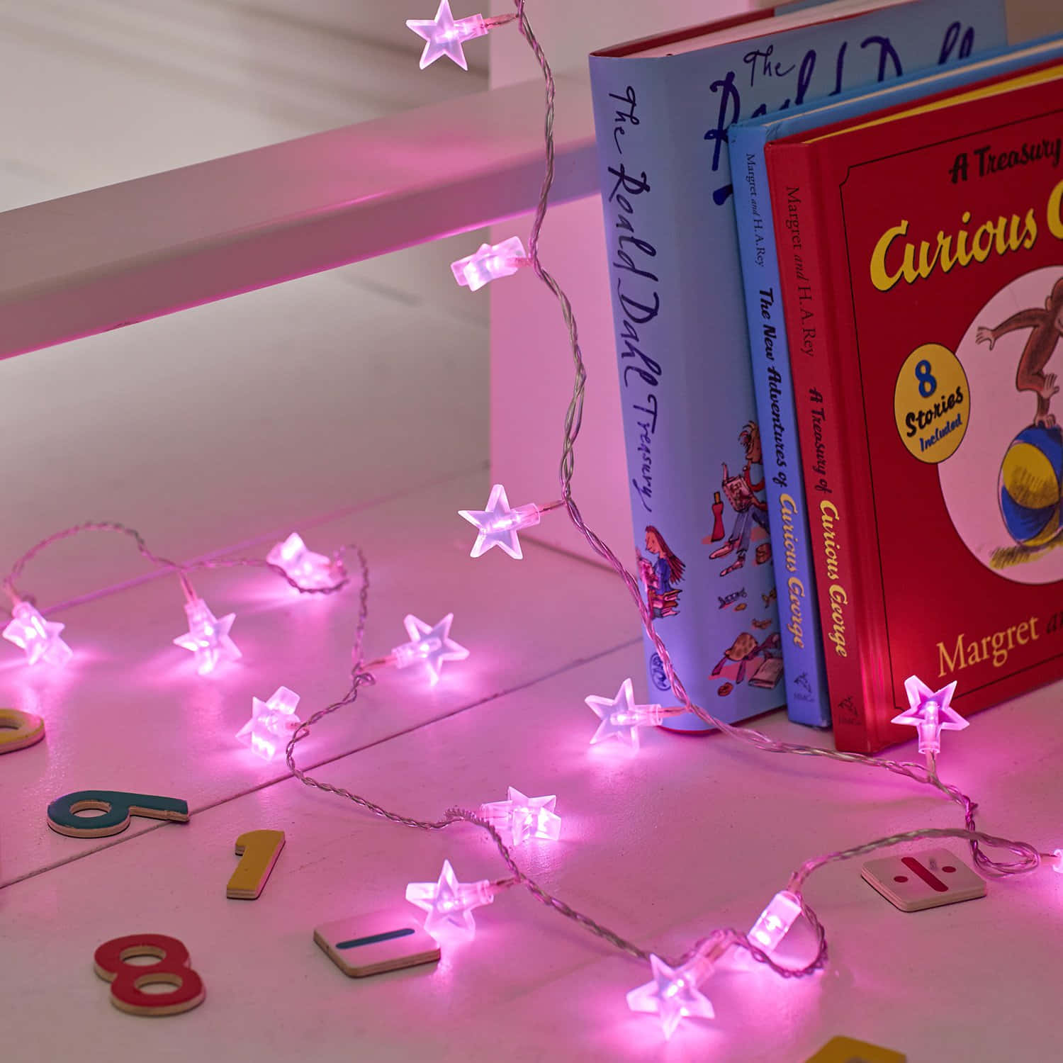 Pink Star Lights With Numbers And Books Background