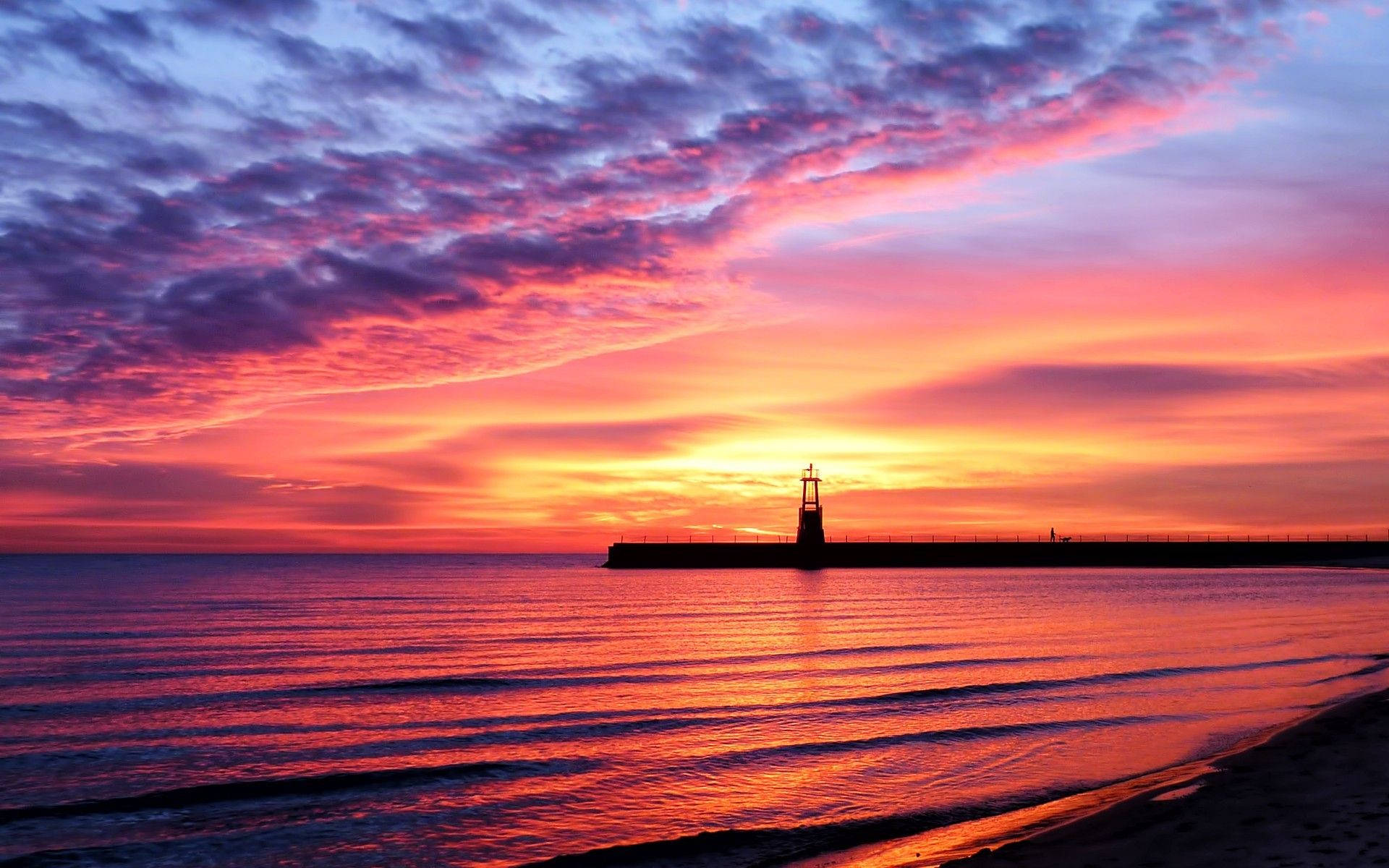 Pink Sunset Distant Lighthouse Background