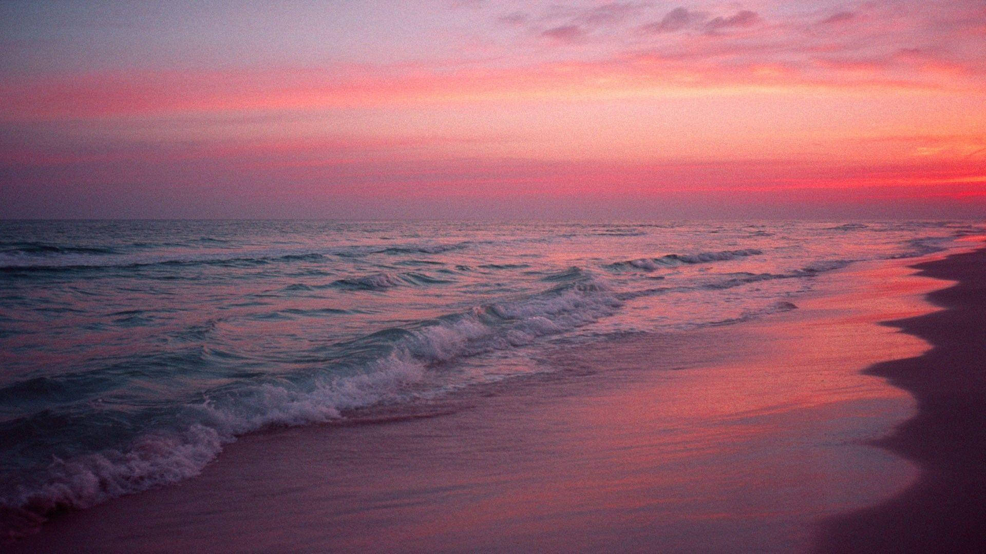 Pink Sunset Rolling Waves Background