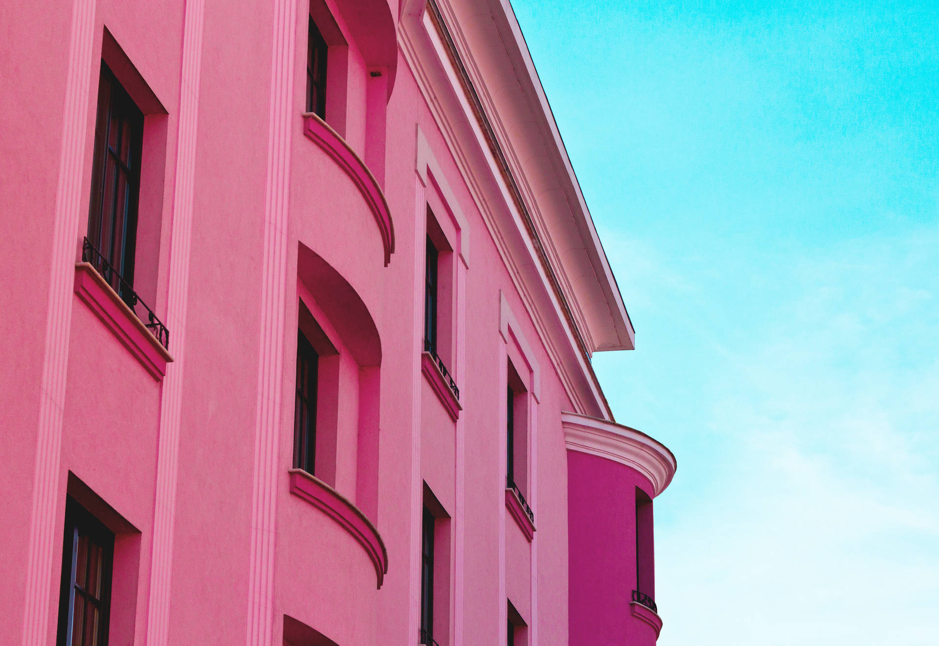 Pink Wall Apartment Building Facade