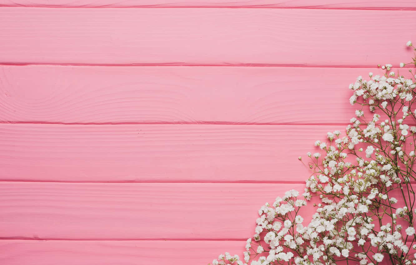 Pink Wooden Wall With Flowers And White Lilies Background