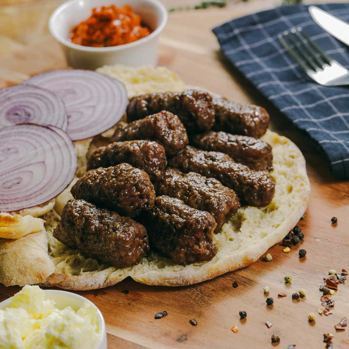 Pita Bread With Layer Of Grilled Ćevapi Sausages Background