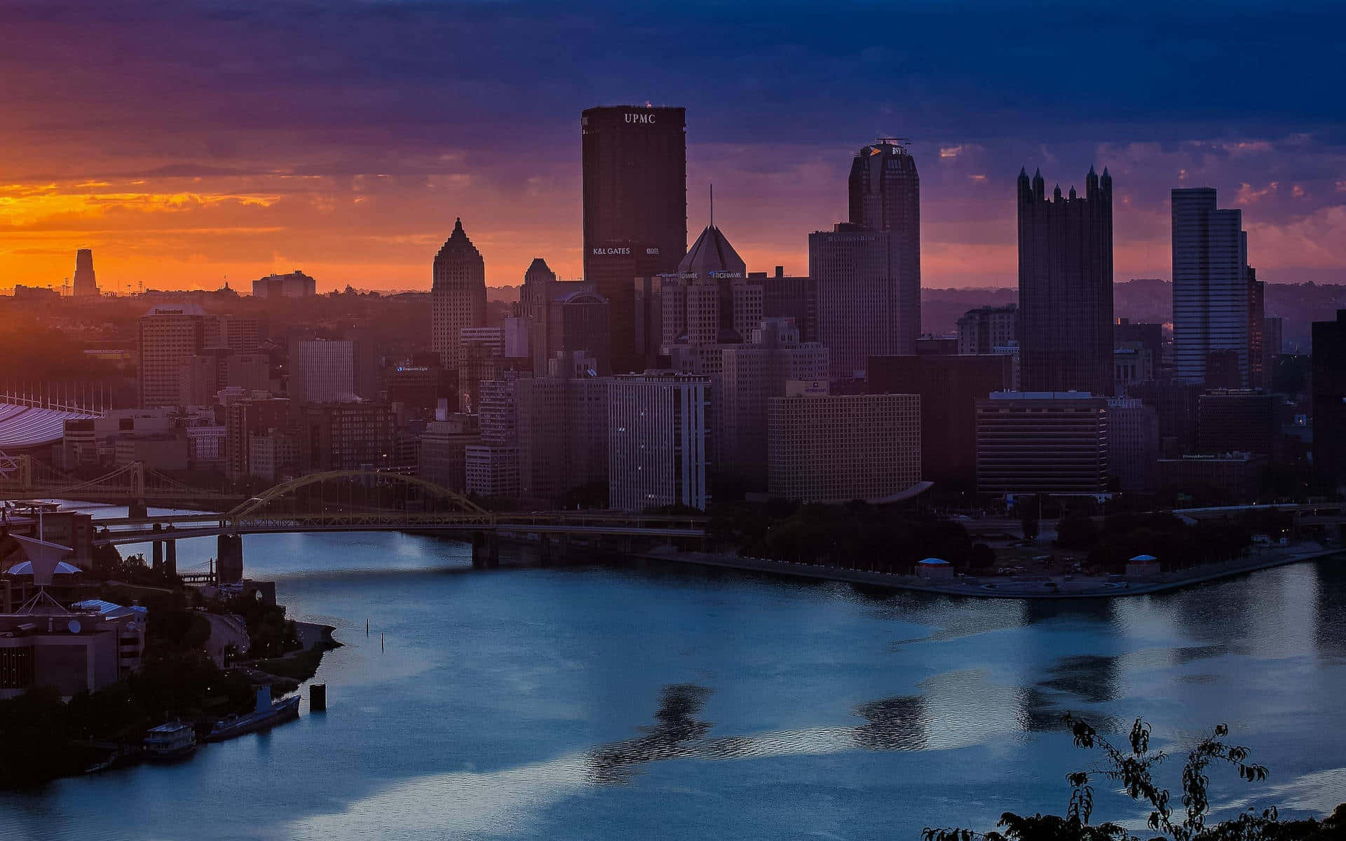 Pittsburgh Skyline And River At Sunset Background