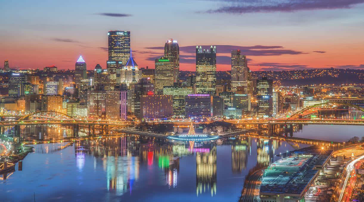 Pittsburgh Skyline Ohio River Near Dusk Background