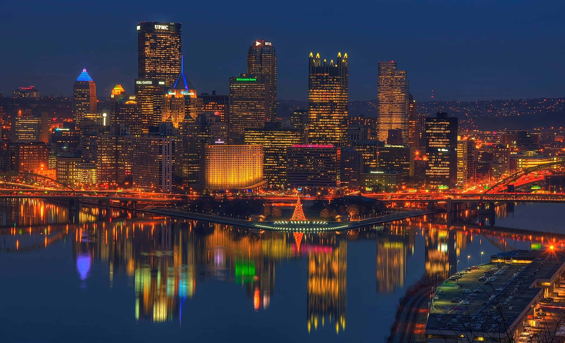 Pittsburgh Skyline With Car Lights At Night Background