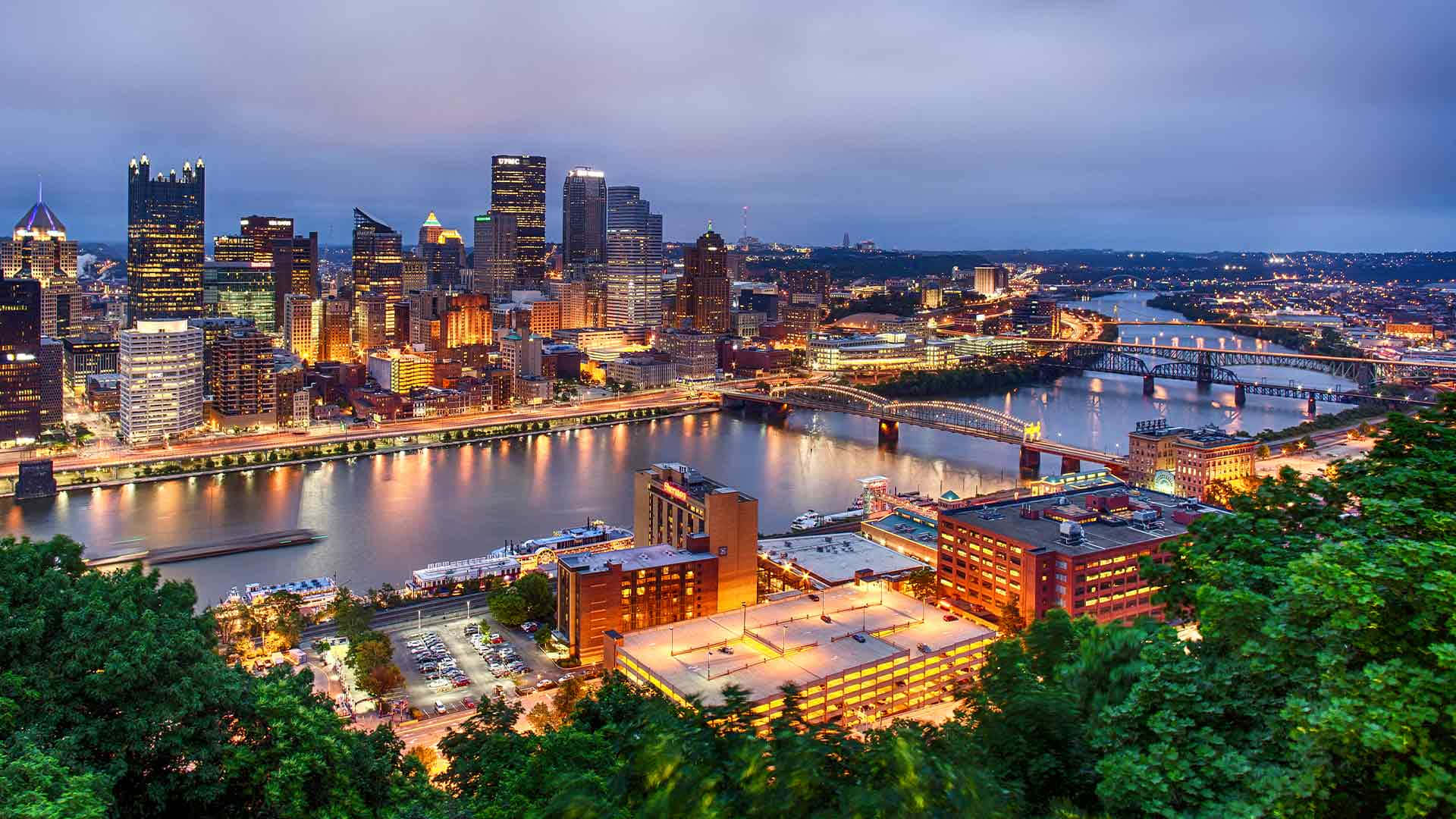 Pittsburgh Skyline With Several Bridges Background