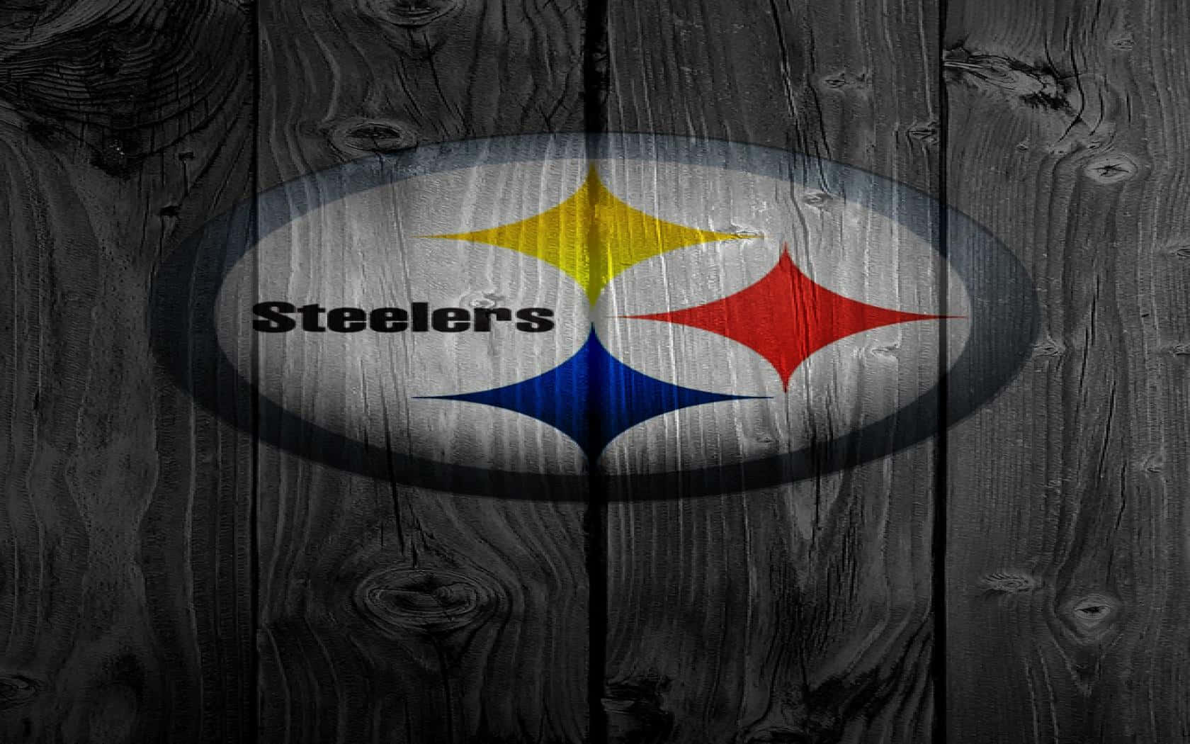 Pittsburgh Steelers Logo On Wood Background