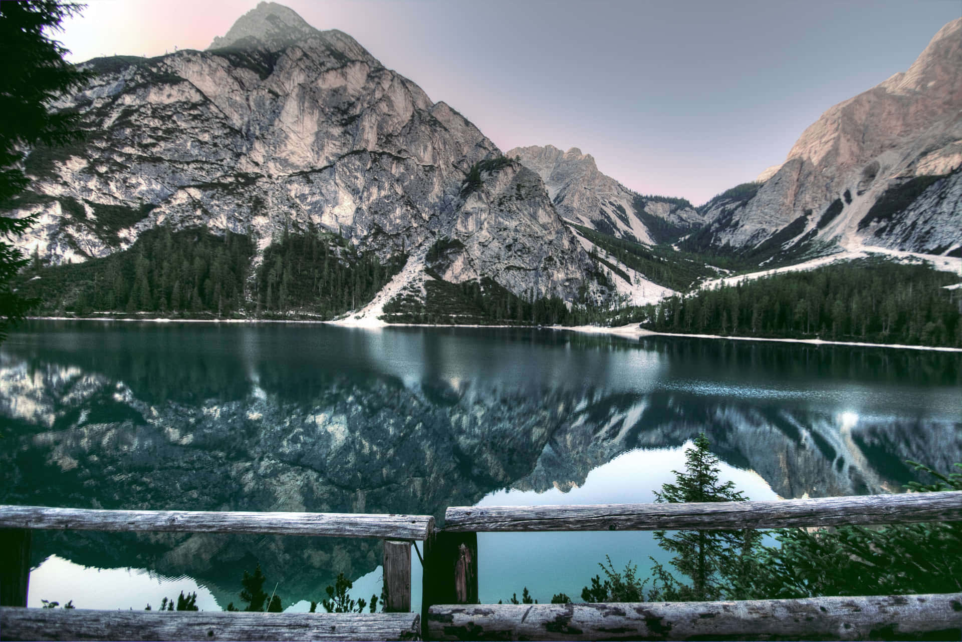 Placid Mountain Reflections On The Waters Background