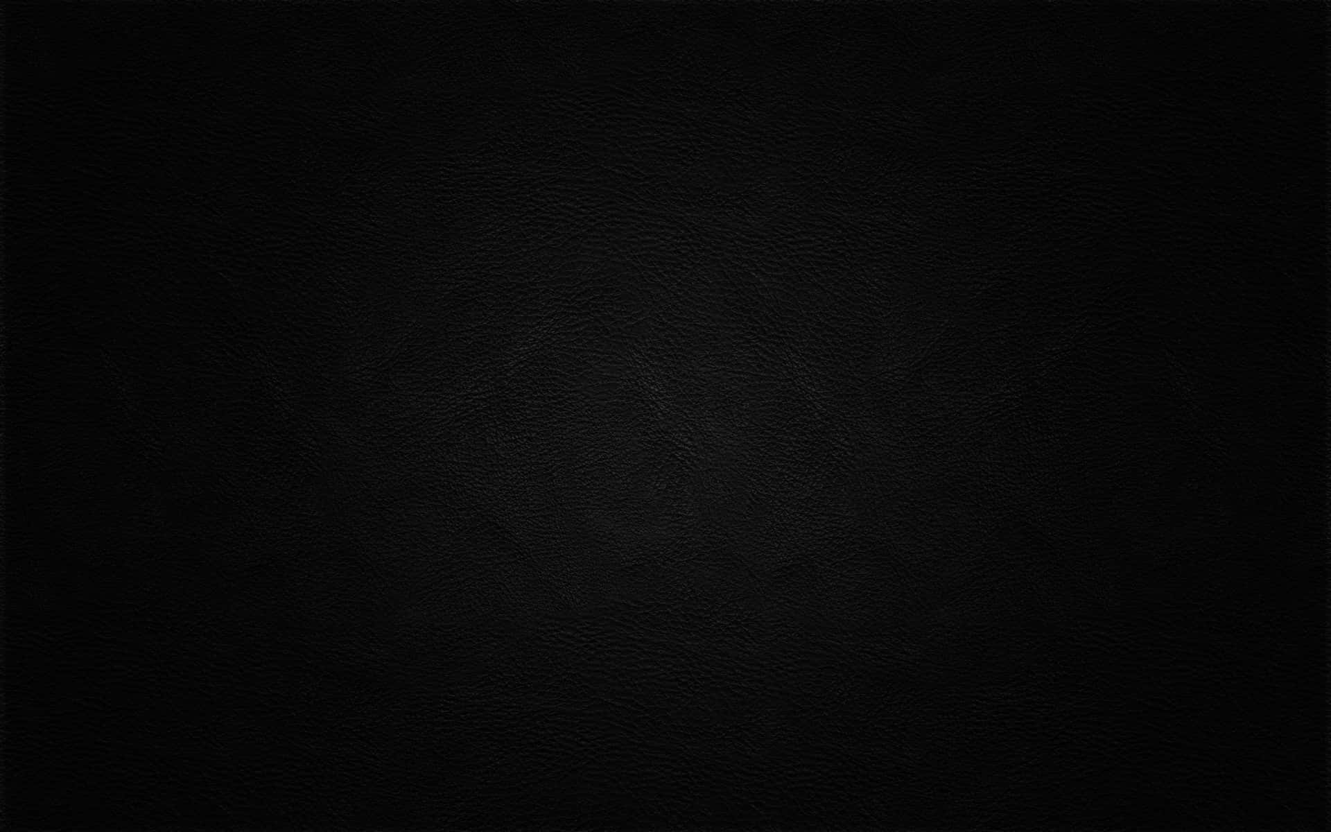 Plain Black Desktop With A Rough Texture Background