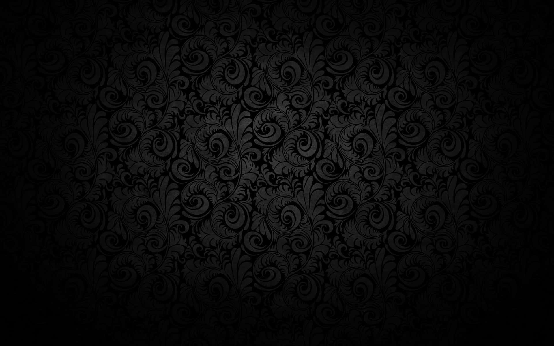 Plain Black Desktop With Swirling Leaves Background