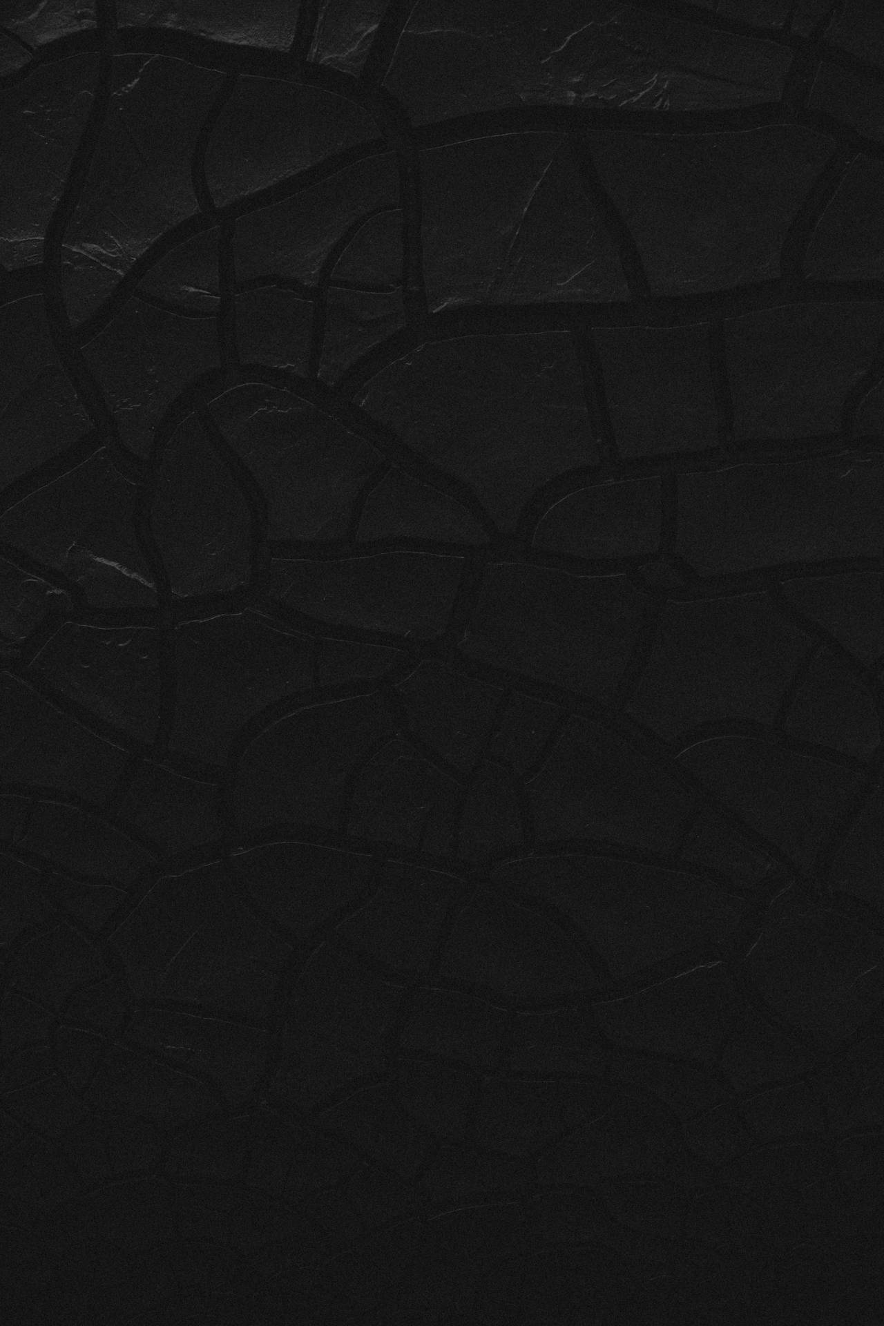 Plain Black With Cracked Surface Background