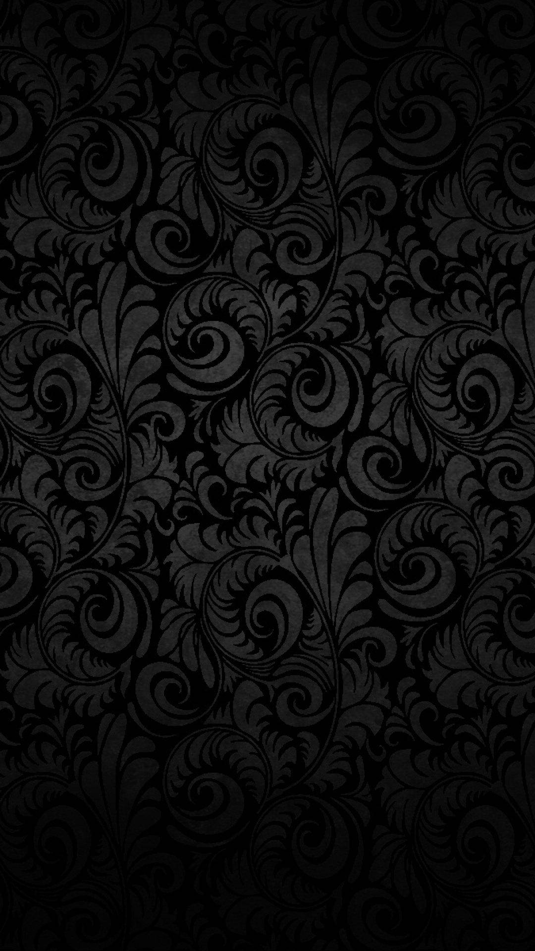 Plain Black With Ornate Leaf Pattern Background