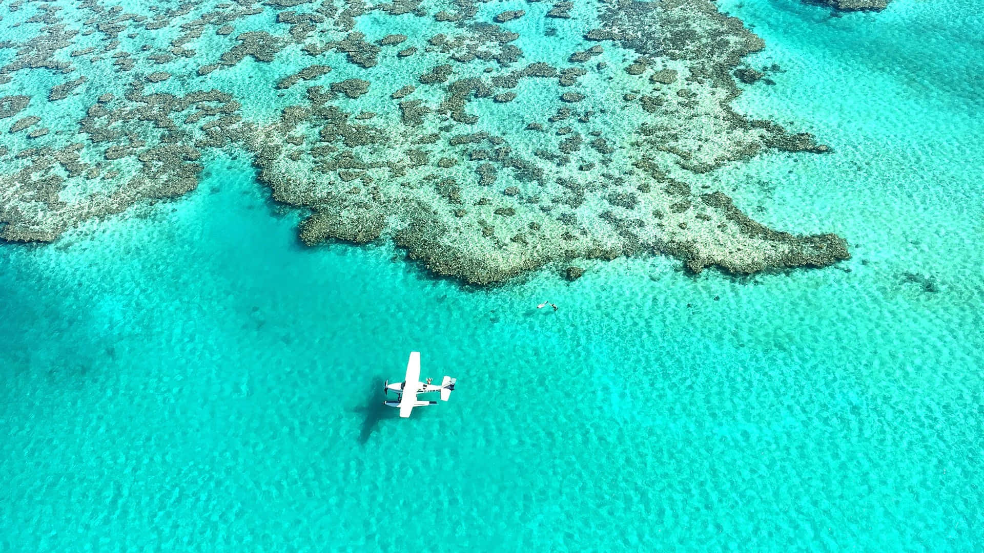 Plane Over Great Barrier Reef Marine Park Background