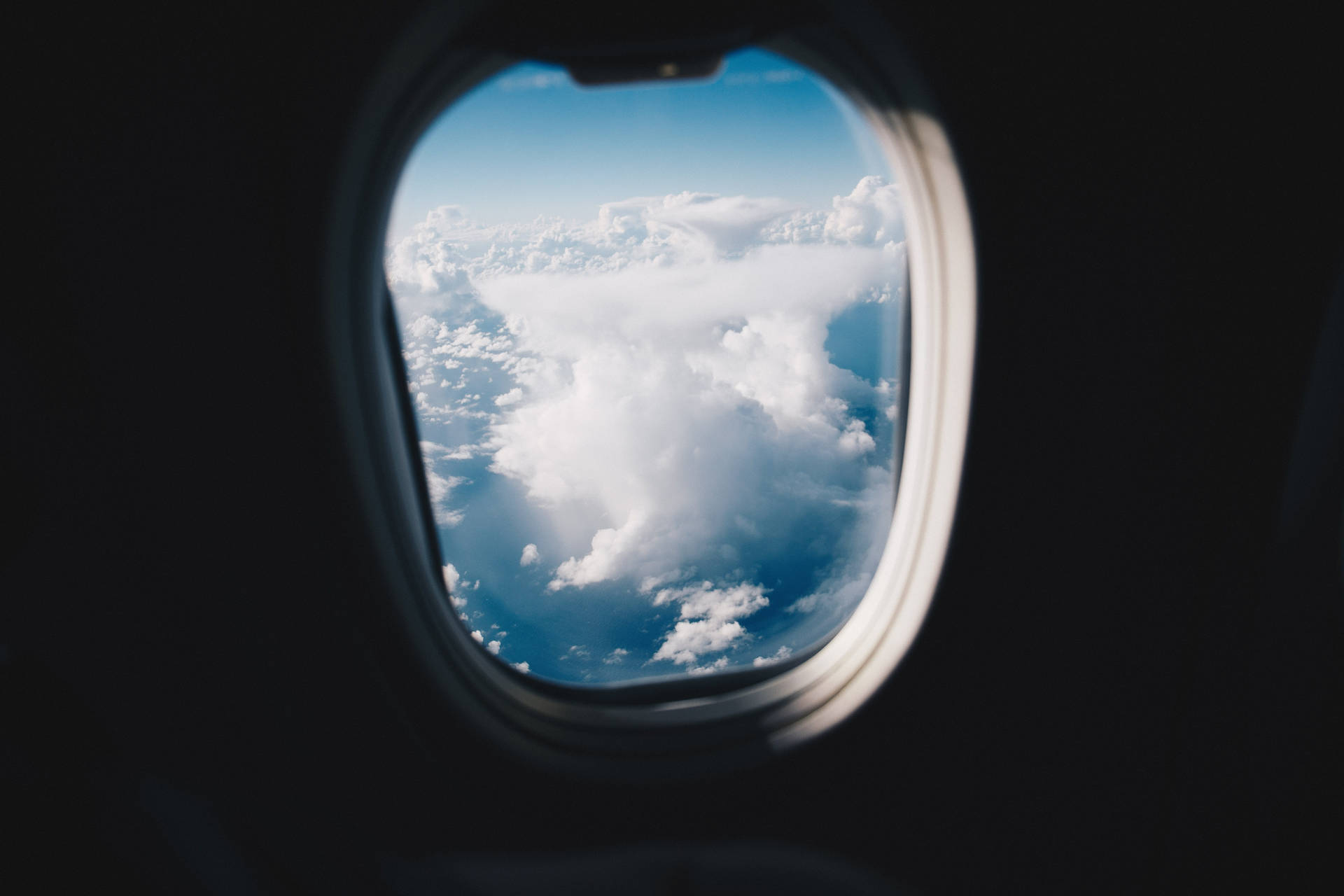 Plane Window Photo Of Cirrus Clouds