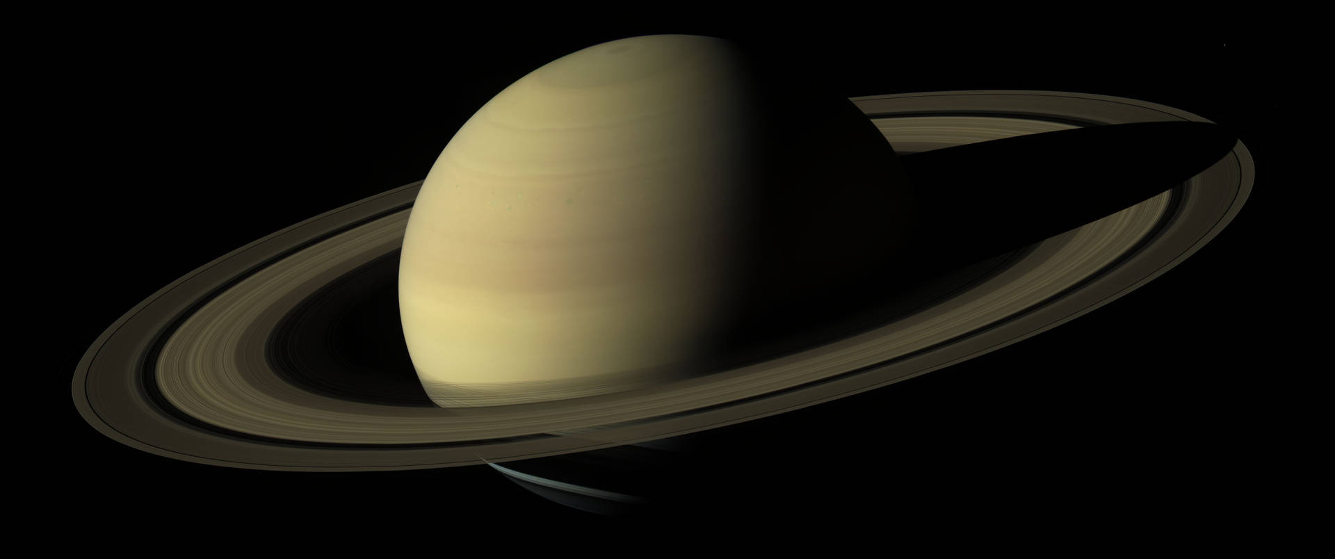 Planet Saturn On Dark Space Background