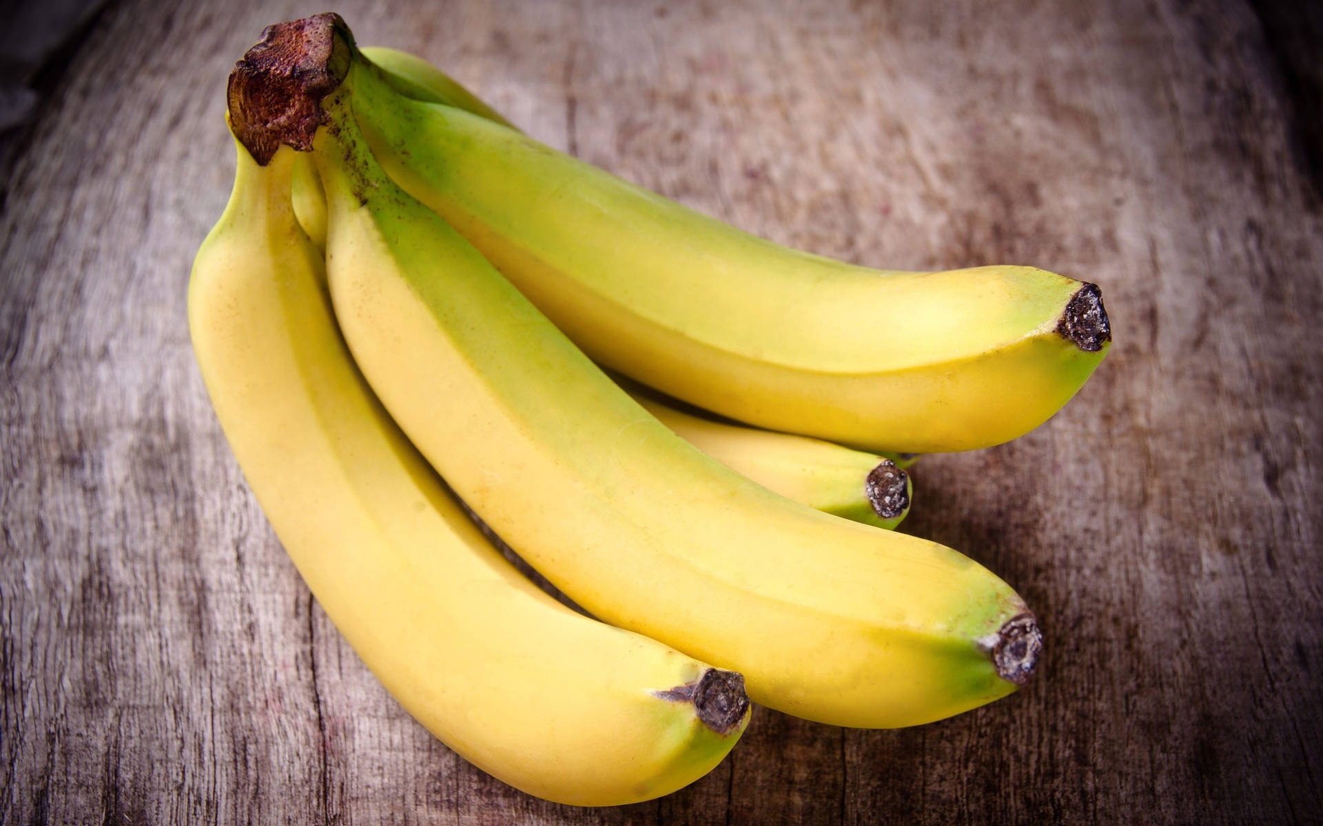 Plantain On Wood Table Background