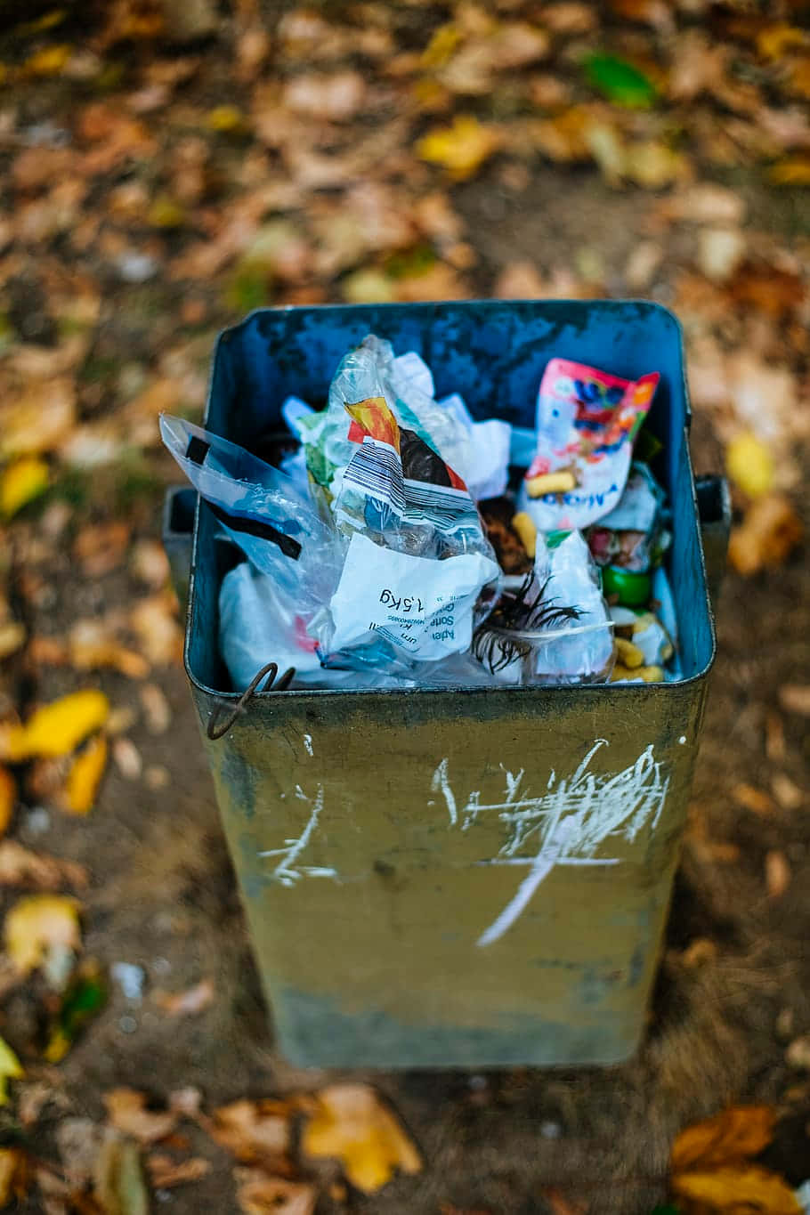 Plastic Wastes Metal Trash Can Background