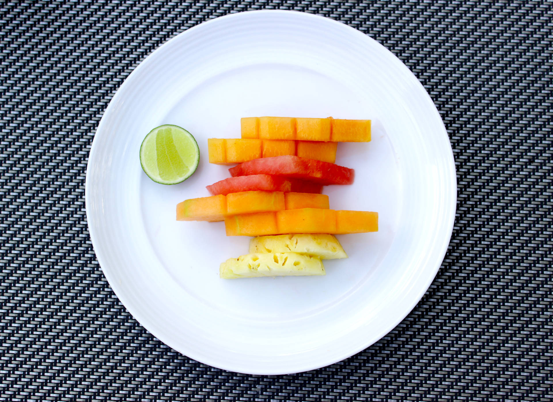 Plate With Fruit Slices Background