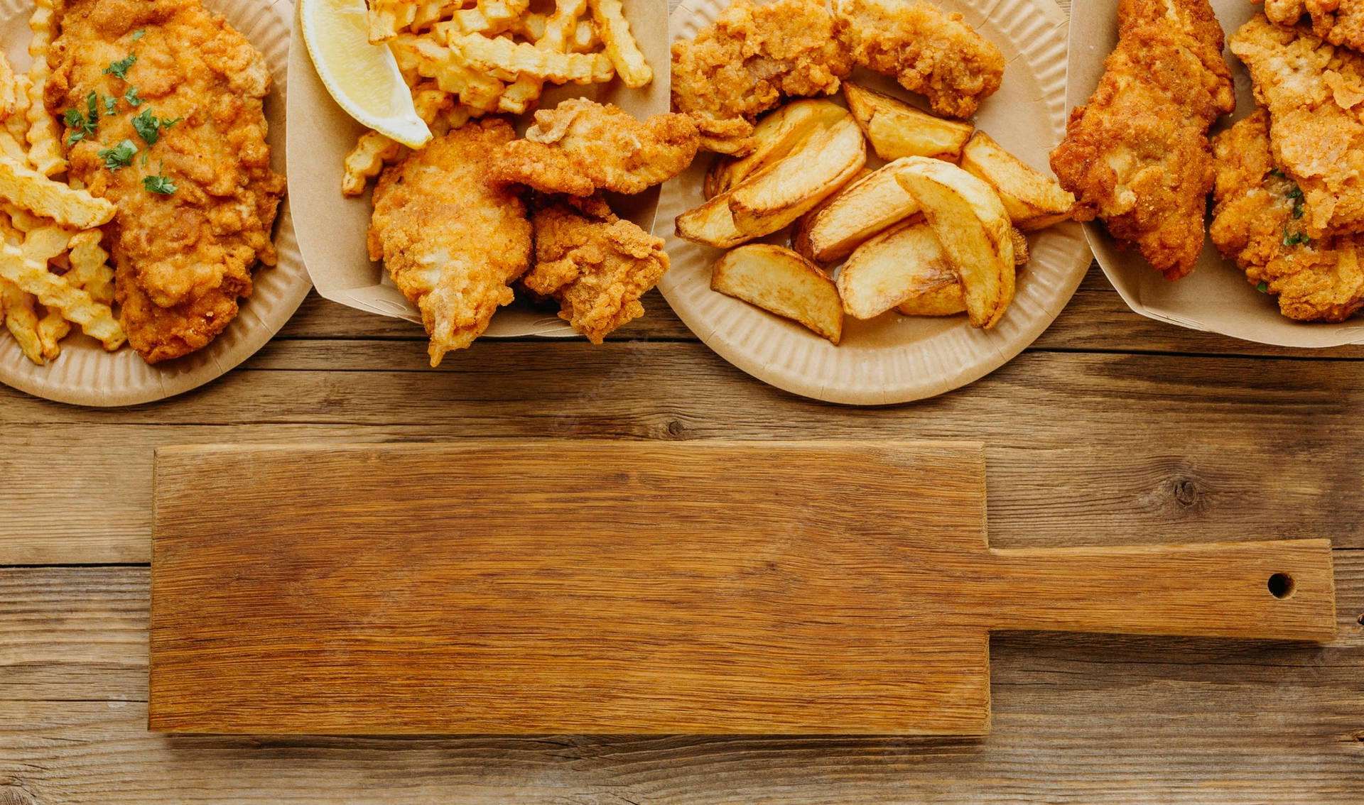 Plates And Trays Of Fish And Chips