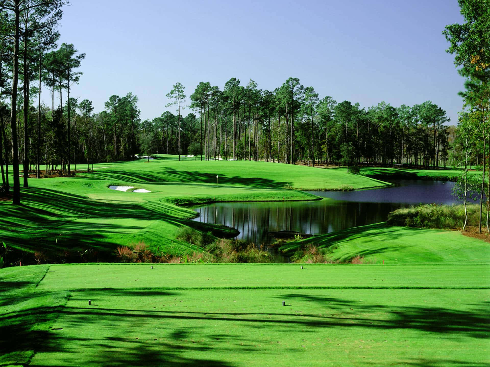 Play A Round Of Awesome Golf With Beautiful Views Background