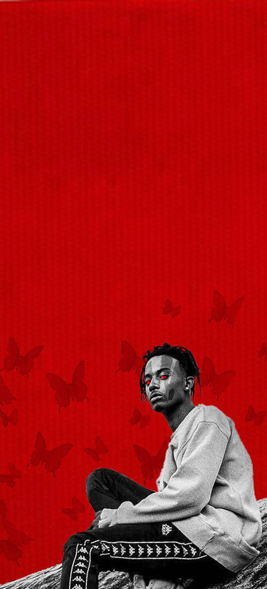 Playboi Carti Looks Angelic As Red Butterflies Surround Him Background