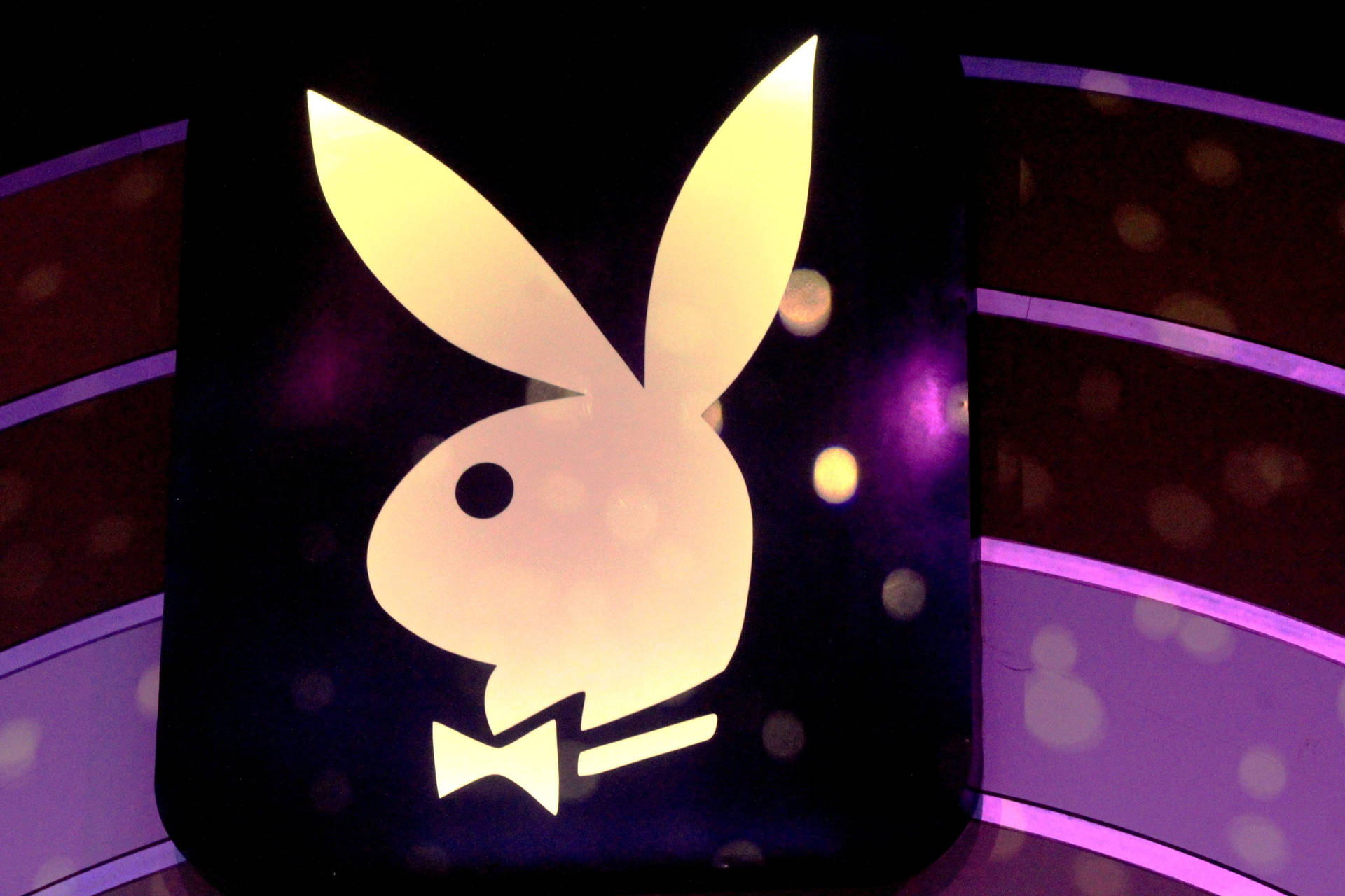 Playboy Logo With Bokeh Lights Background