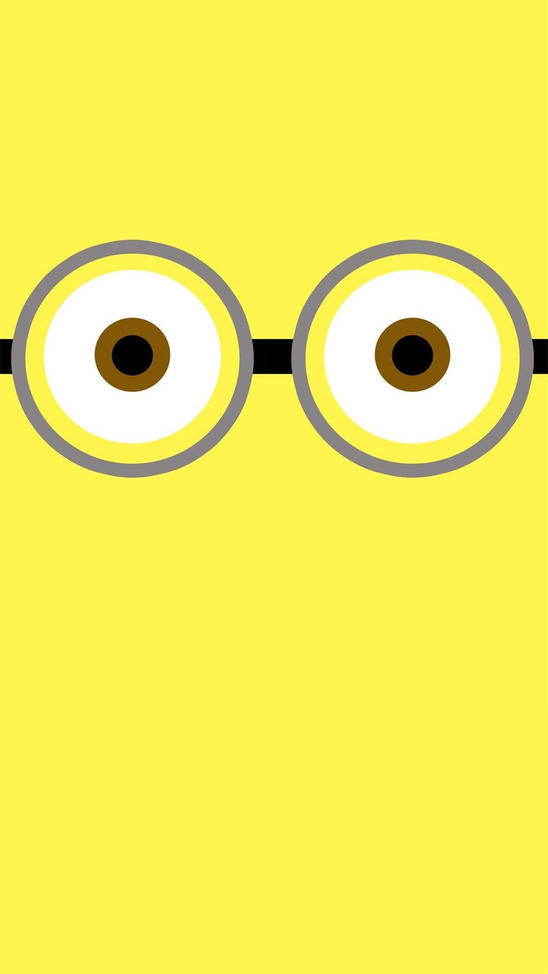 Playful Minion Eyes On A Cute Yellow Background Background