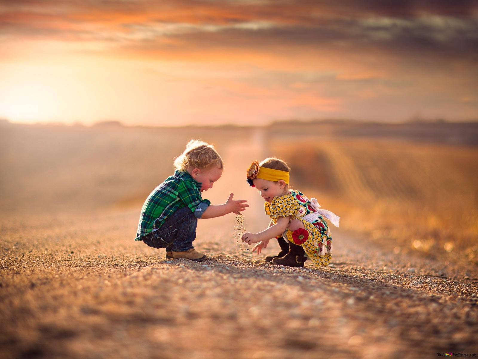 Playing Children In The Sand