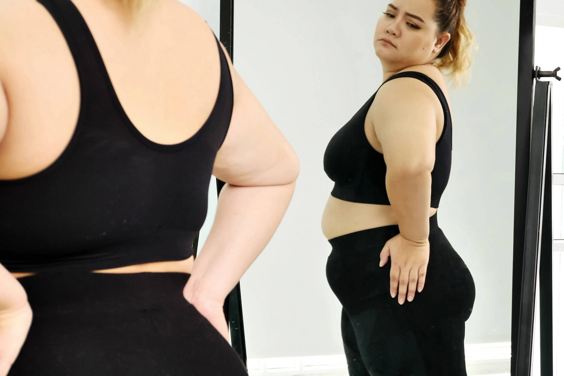 Plus Size Woman Embracing Her Reflection Background