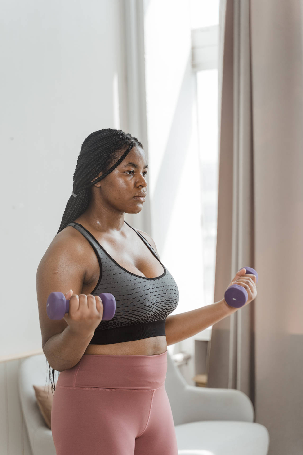 Plus Size Woman Exhibits Strength In Fitness Background