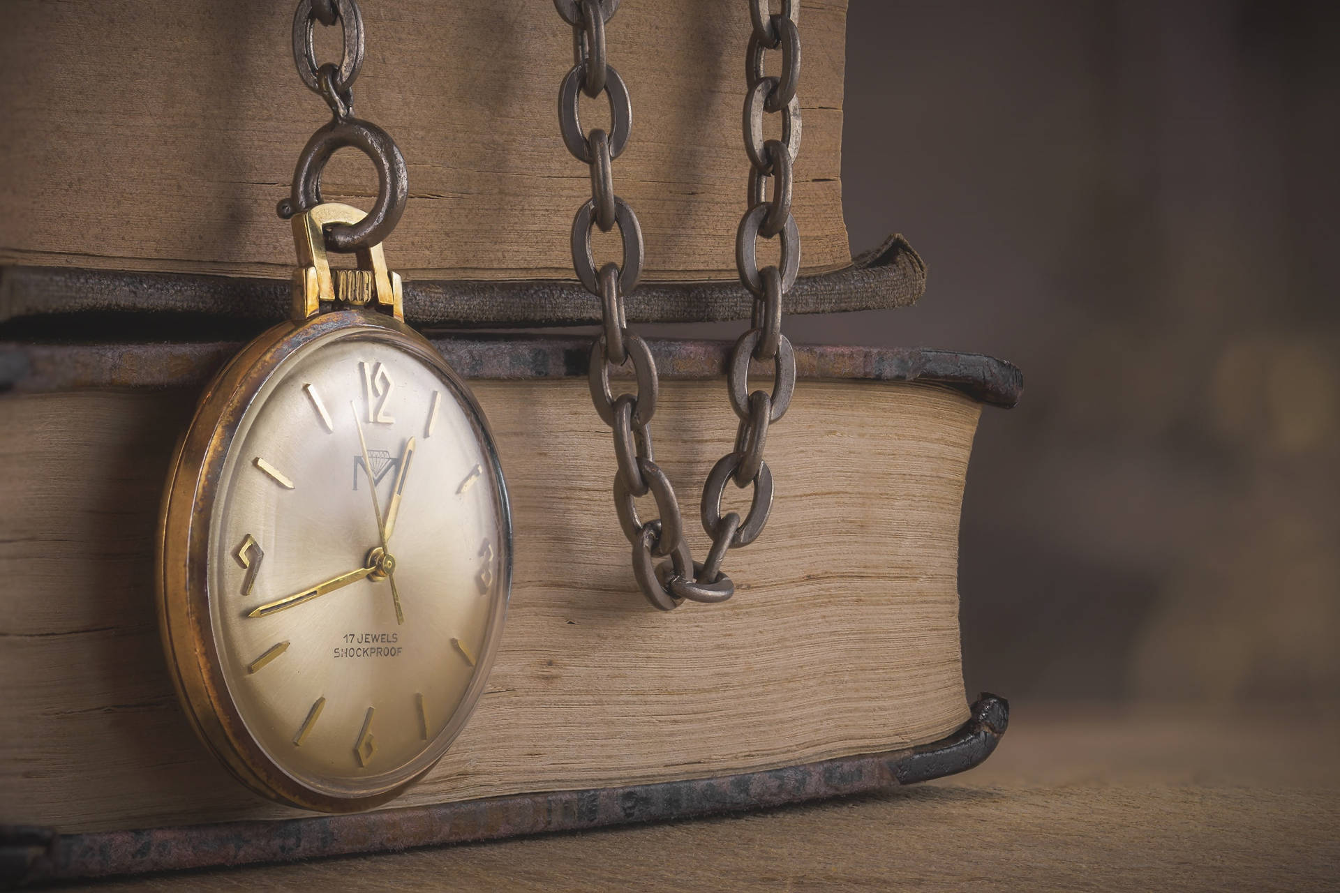 Pocket Watch Hanging On Books Tiempo Background Background