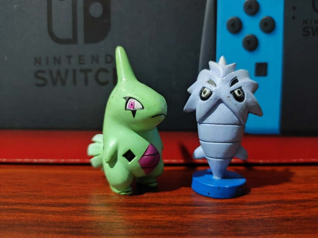 Pokemon Figurines Larvitarand Pupitar Nintendo Switch Background Background