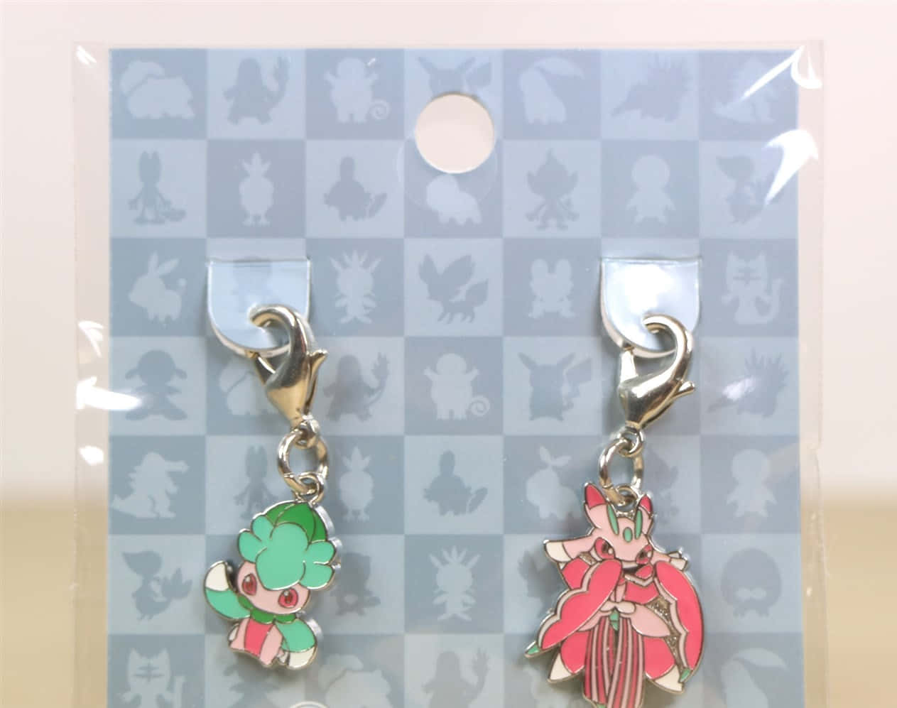 Pokémon Fomantis And Lurantis Keychain Background