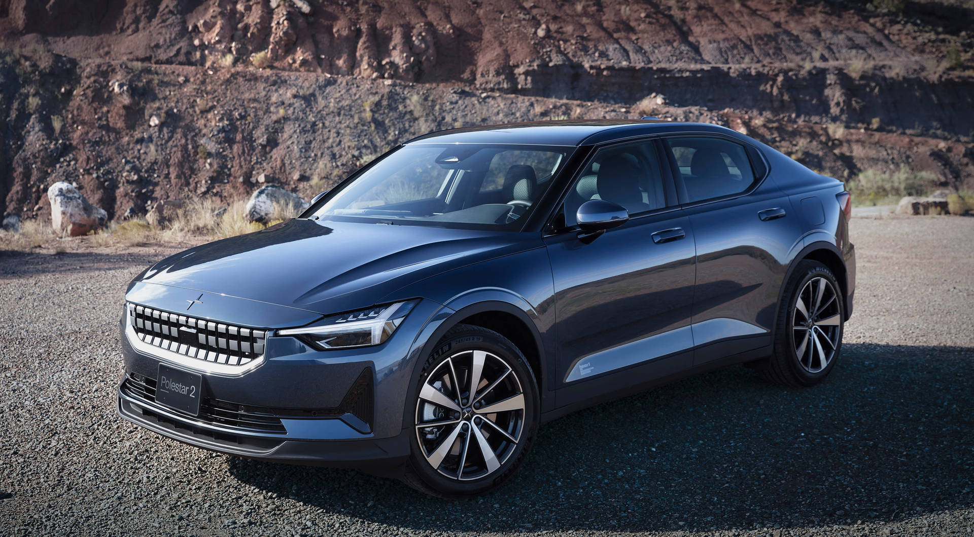 Polestar 2 In A Desert Location Background