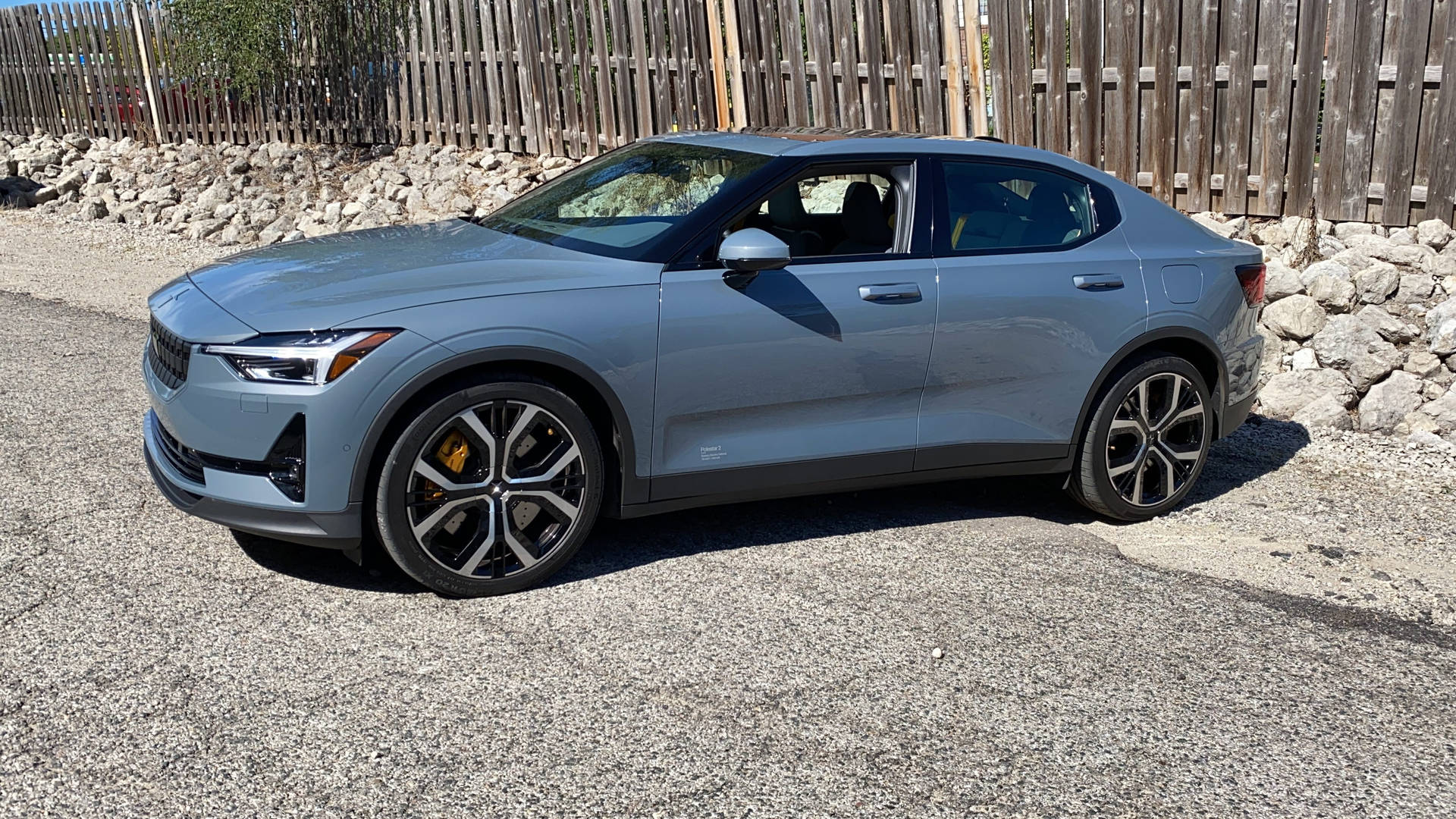 Polestar 2 Parked Under The Sun Background