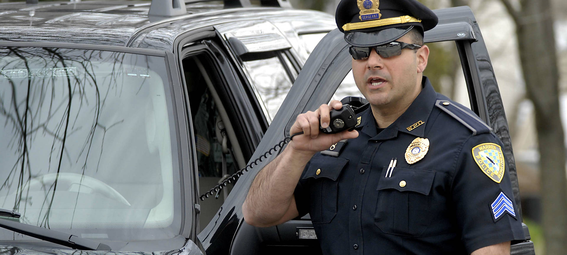 Police Officer Talking On Radio