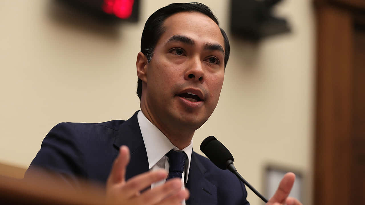 Politician Julián Castro Engaged In A Public Discussion. Background