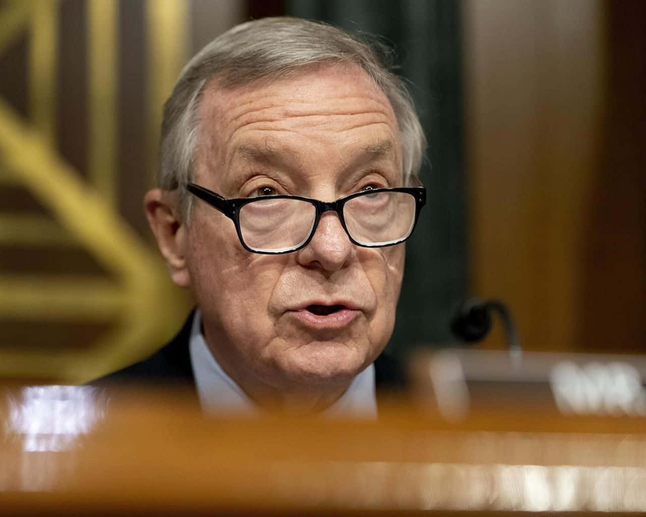 Politician Richard Durbin With Glasses Background