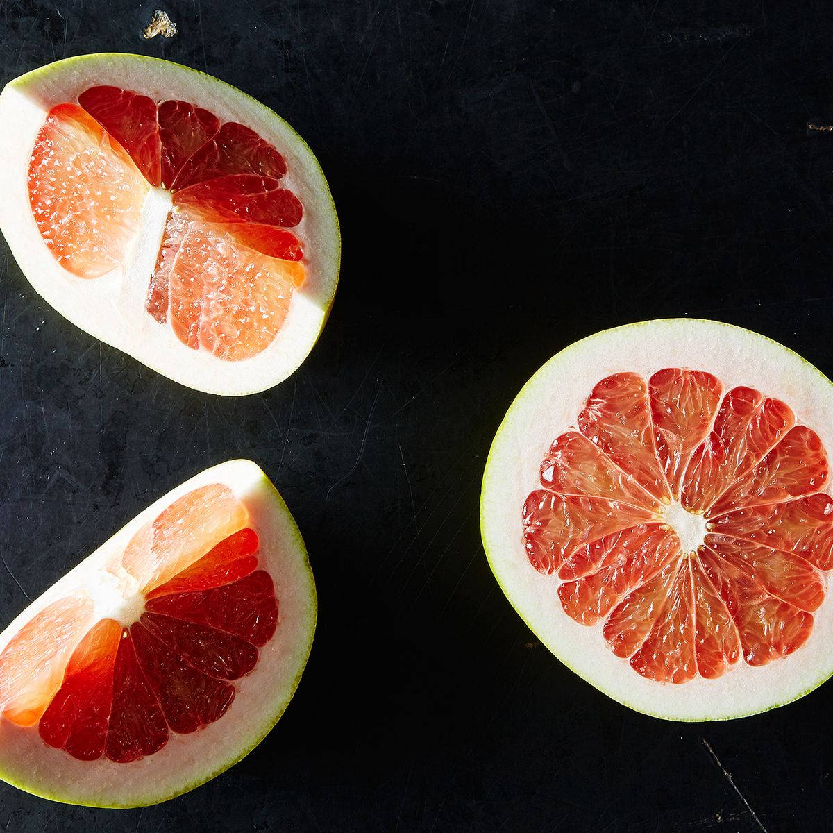 Pomelo Slices In Black Background